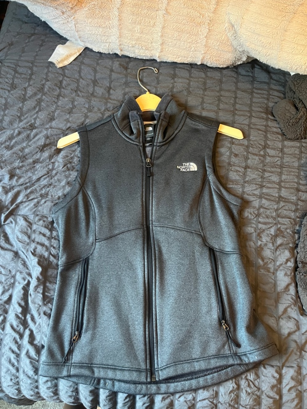 Green north face vest